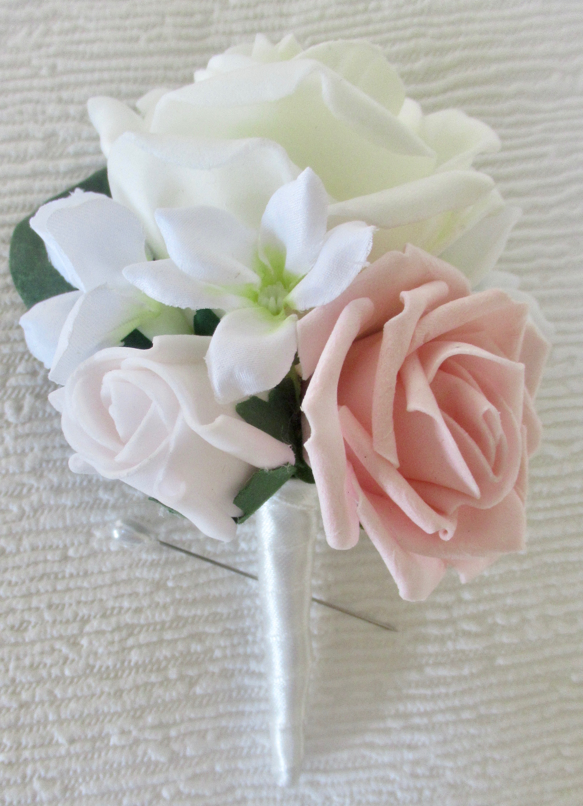 ivory and pink buttonhole